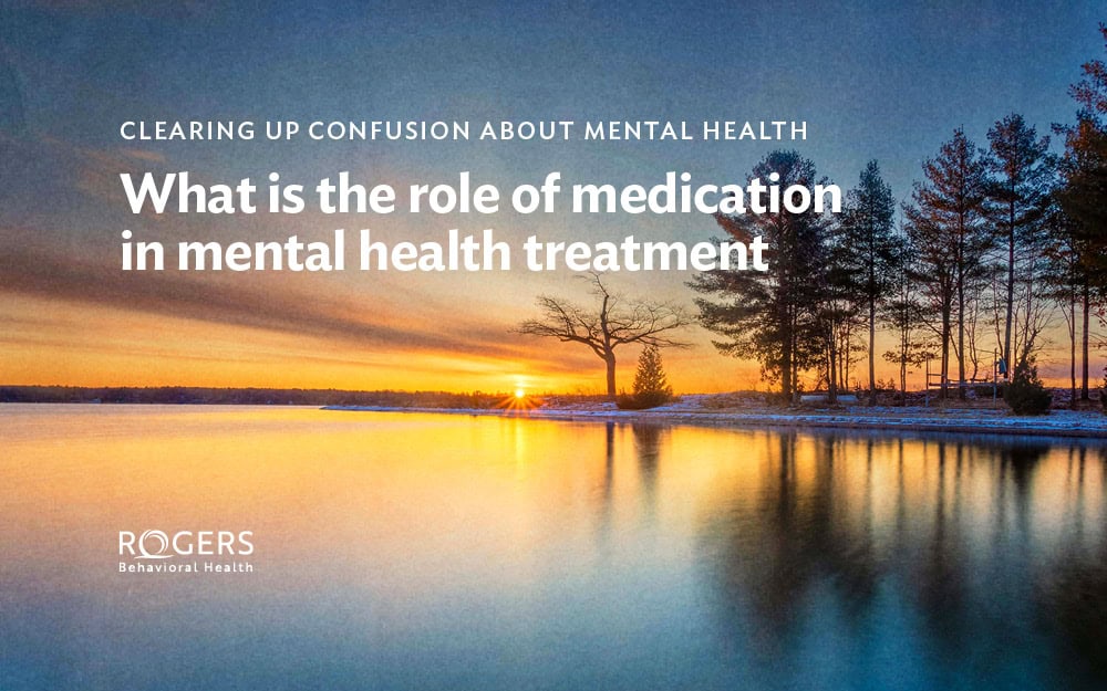 The image shows a serene landscape at sunset with a calm lake in the foreground. Overlaid on the image is text: Clearing Up Confusion about Mental Health What is the Role of Medication in Mental Health Treatment
