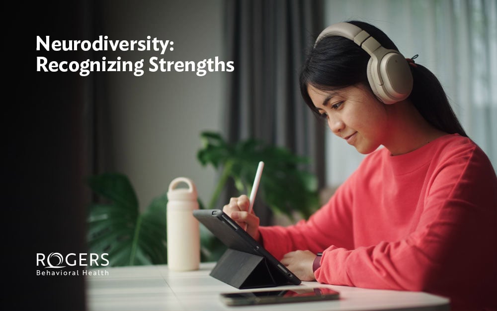 The image depicts a neurodiverse young person wearing large over-ear headphones, focused on a tablet in front of them. Text says Neurodiversity: Recognizing Strengths