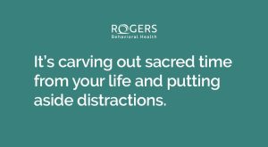 Teal background with white text about residential mental health treatment that says, "It's carving out sacred time from your life and putting aside distractions."
