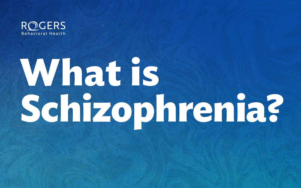 The image features a background with smooth, wavy patterns in shades of blue and teal. In the center, large white text asks the question "What is Schizophrenia?