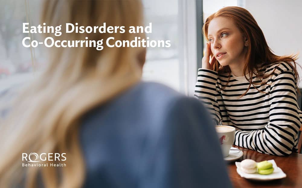 The image shows two women talking over coffee. One is sharing why she's anxious. Text says Eating disorders and co-occurring conditions