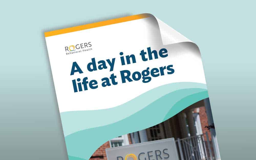 Rogers Behavioral Health booklet titled “A day in the life at Rogers,” featuring teal wave graphics and a photo of a Rogers facility.