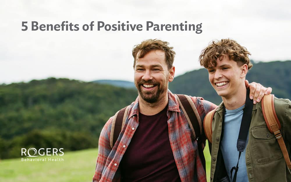 Image shows a father and son having a moment of connection through positive parenting.
